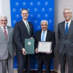 June 22, 2015 - Senator Hutchinson presented faculty from Slippery Rock University with a citation honoring their reception of the Green Ribbon School Award given to them by the US Department of Education. The award is given to schools that reduce their environmental impact and cost, improve the health and wellness of schools, students, and staff, and/or provide environmental education to its students and faculty. 06/22/15