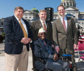 April 22, 2015 – Senator Hutchinson, along with Senator Vulakovich and Representative Saccone, spoke with a veteran during the Senate Veterans Affairs & Emergency Preparedness Committee’s annual DAV Van Drive Off at Soldiers’ Grove on Commonwealth Avenue. 04/22/15