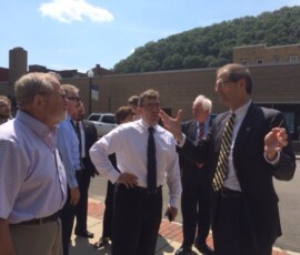 August 14, 2015 – Senator Hutchinson speaks with DCED Secretary Dennis Davin during a visit to Oil City to discuss economic development projects. 08/14/15