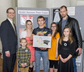 April 15, 2014 – Senator Hutchinson met with Austin Shaw (center) and his family, residents of Venango County, at a ceremony at the capitol where Austin was recognized by the Pennsylvania Liquor Control Board for his award-winning Alcohol Awareness artwork. Also pictured from left are Austin’s brother, Derek; mother Jamie; sister Rebecca; father Devlin; and sister Misty. 04/15/14